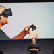 Foreground: Xbox executive Phil Spencer at today’s Oculus announcement event. Background: A slack-jawed Oculus Rift user who possesses a beard and a penis. (Photo: Engadget)